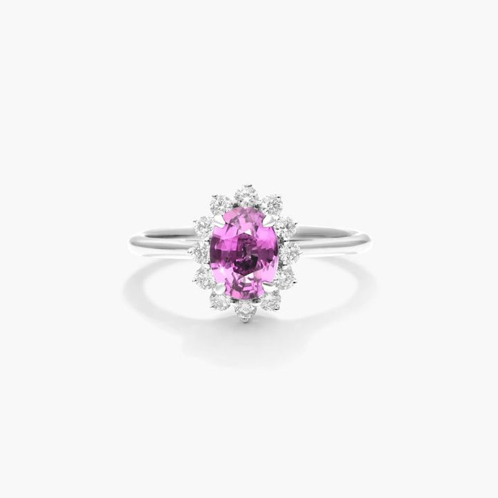 14K White Gold Oval Sunburst Halo Tanzanite and Diamond Ring (7x5mm)