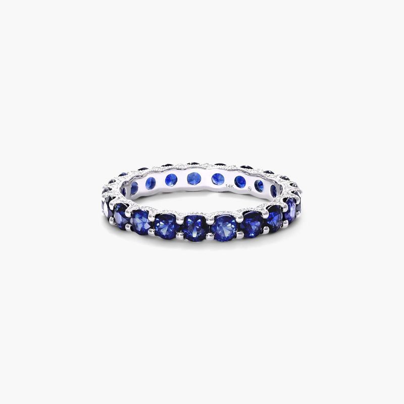 Platinum Round Brilliant Diamond and Marquise Sapphire Wedding Ring