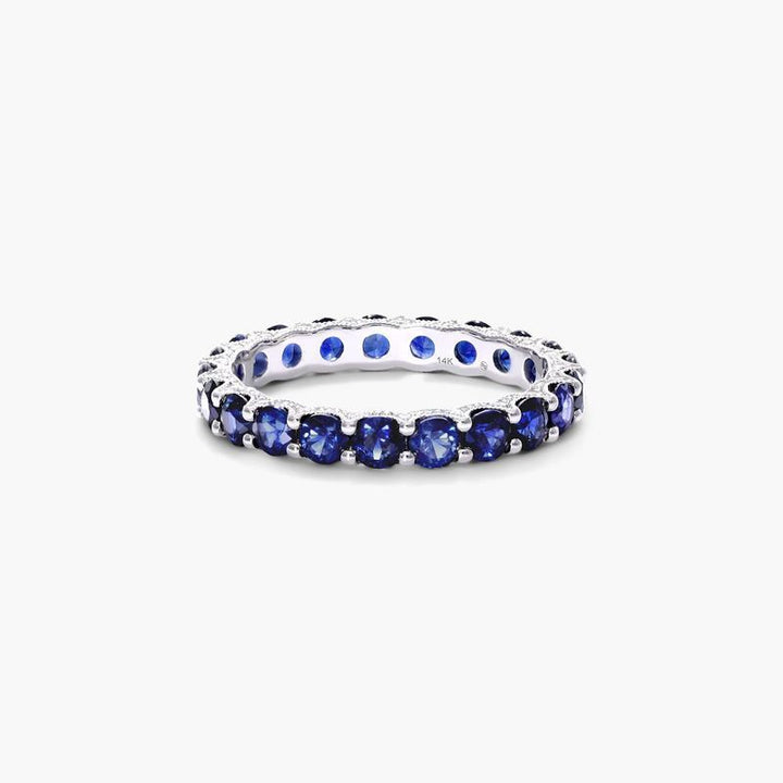 Platinum Round Brilliant Diamond and Marquise Sapphire Wedding Ring